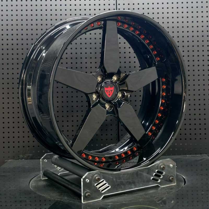 XL-DUAL-SERIES-002 Spoke Geometry & Red Hardware Craftsmanship Detail XL DUAL SERIES-002 aerospace 6061-T6 forged rim displaying gloss black 5-spoke contour and anodized red assembly bolts