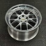 XL DUAL SERIES-003 aerospace 6061-T6 forged rim displaying silver cross mesh spokes and polished stepped dish