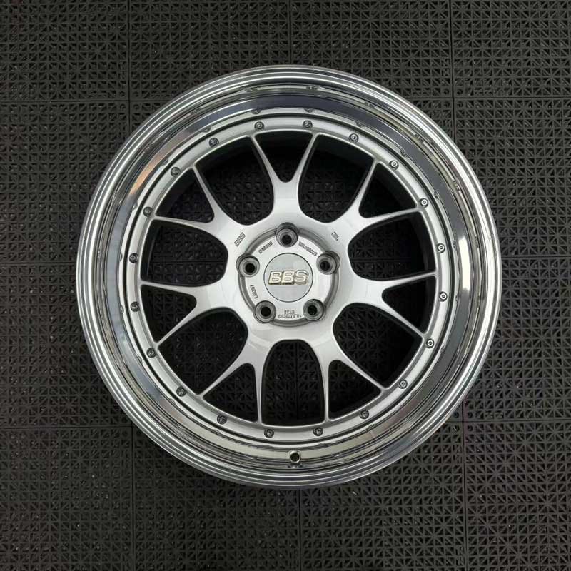 XL-DUAL-SERIES-003 Stepped Lip Depth & 2-Piece Barrel Profile XL DUAL SERIES-003 deep stepped lip two-piece forged racing rim angled view showing barrel depth and assembly hardware