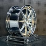 XL DUAL SERIES-005 aerospace 6061-T6 forged rim displaying directional turbine blade contours and hand-brushed silver grain