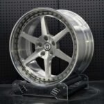 XL DUAL SERIES-007 deep stepped lip two-piece forged rim angled view showing barrel depth and perimeter assembly bolts