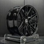 XL MONO SERIES-008 aerospace 6061-T6 aluminum forged rim displaying gloss black spoke cutouts and cooling ventilation