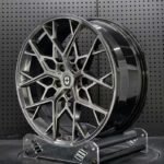 XL MONO SERIES-010 deep concave multi-spoke mesh forged rim angled view showing barrel depth and spoke facets