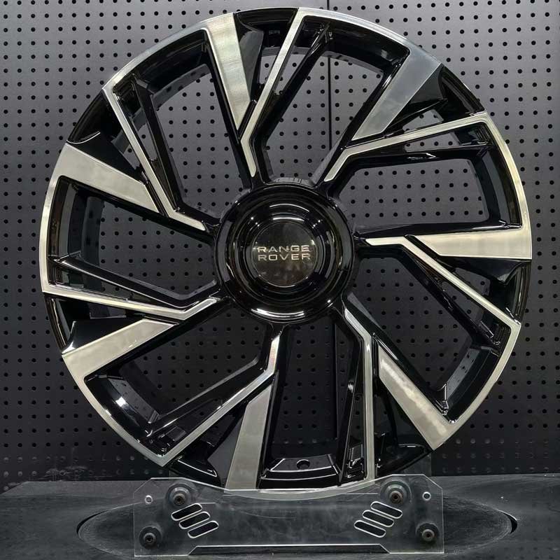 XL-MONO-SERIES-011 Directional Turbine Forged Wheel - Front XL MONO SERIES-011 two-tone gloss black machined face directional turbine monoblock forged wheel for Range Rover
