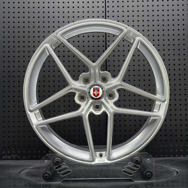 XL-MONO-SERIES-012 Satin Silver Split 5-Spoke Forged Wheel - Front XL MONO SERIES-012 satin silver split 5-spoke monoblock forged wheel front face with HRE center cap for sports cars