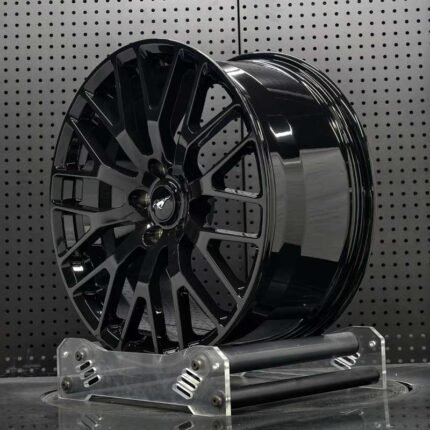XL MONO SERIES-021 aerospace 6061-T6 aluminum forged rim displaying gloss black spoke contours and brake cooling ventilation
