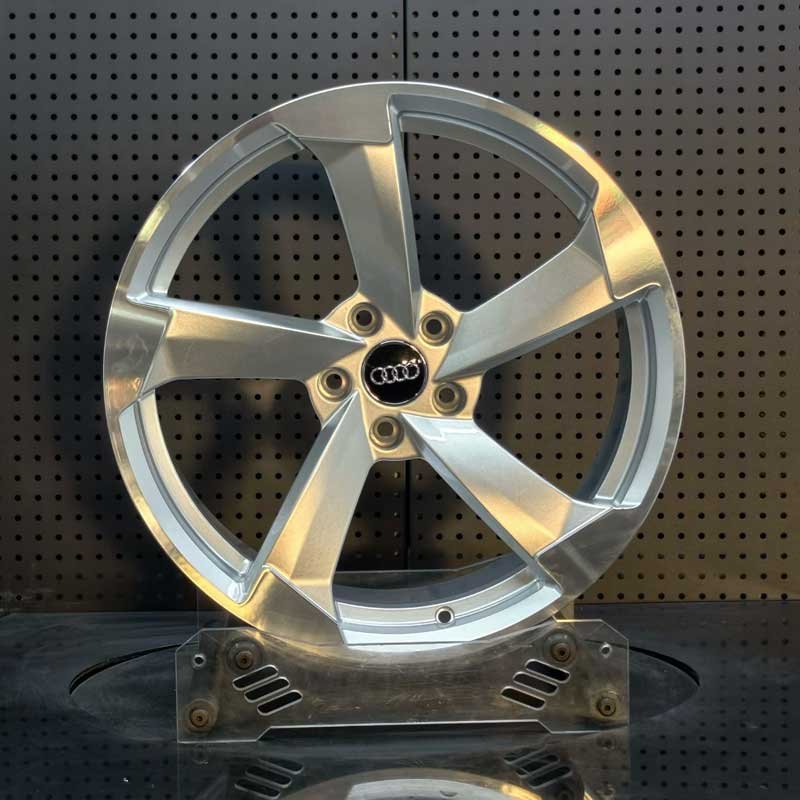 XL-MONO-SERIES-026 Directional 5-Spoke Forged Wheel - Front Face XL MONO SERIES-026 metallic silver directional blade 5-spoke monoblock forged wheel front face with Audi center cap for RS models