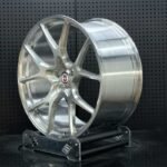 XL MONO SERIES-028 aerospace 6061-T6 forged rim displaying hand-brushed aluminum grain and Y-spoke contours