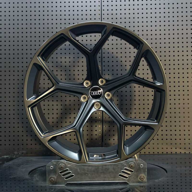 XL-MONO-SERIES-032 Satin Titanium RS Forged Wheel - Front Face XL MONO SERIES-032 satin titanium geometric 5-Y-spoke monoblock forged wheel front face with Audi RS badge
