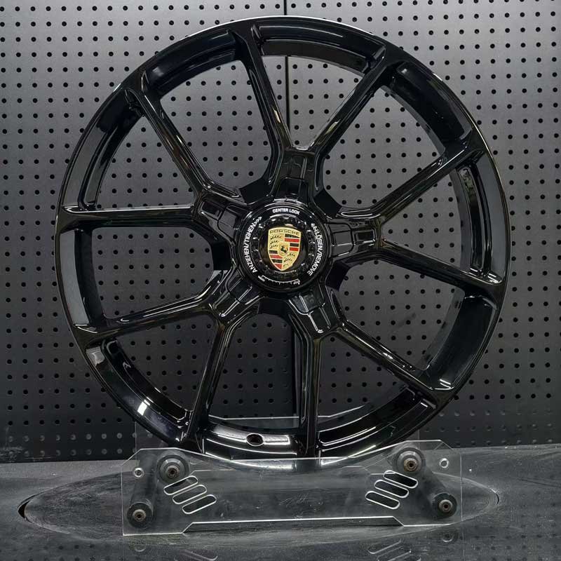XL-MONO-SERIES-036 Gloss Black Center-Lock GT3 Wheel - Front Face XL MONO SERIES-036 gloss black 5-split Y-spoke center-lock monoblock forged wheel front face with Porsche crest emblem