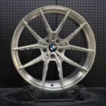 XL MONO SERIES-038 brushed clear skeletonized split 5-spoke monoblock forged wheel front face with BMW center cap and M Performance engraving