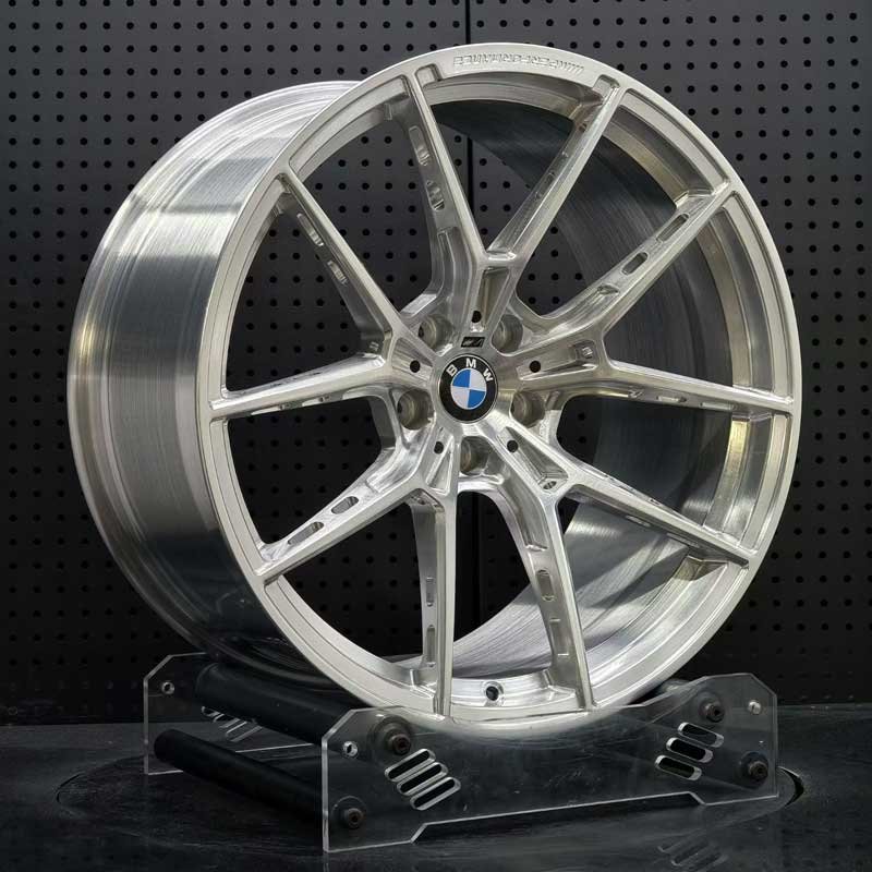 XL-MONO-SERIES-038 Concave Track Profile & Barrel Depth XL MONO SERIES-038 concave brushed clear split-spoke forged racing rim angled view showing barrel depth and spoke lightening holes
