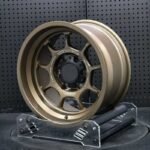 XL OFF-ROAD SERIES-001 deep stepped dish matte bronze 4x4 forged rim angled view showing barrel depth and lip profile